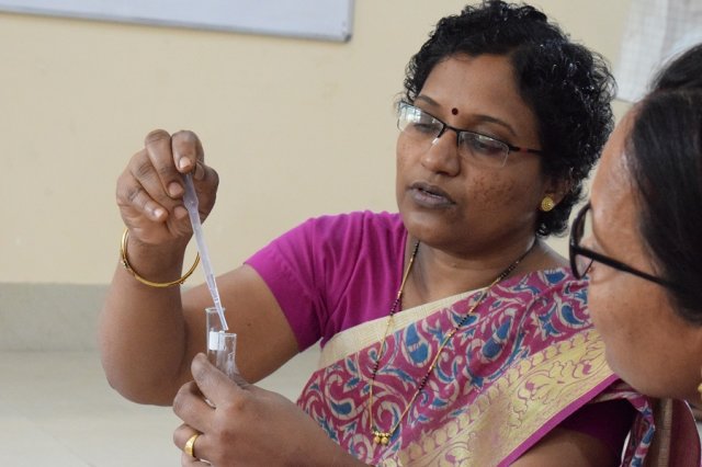 Now add 20 drops of HCl and then add 2 drops of phenolphthalein.